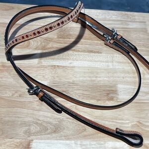 New Riata horse headstall. With red stones and silver grommets